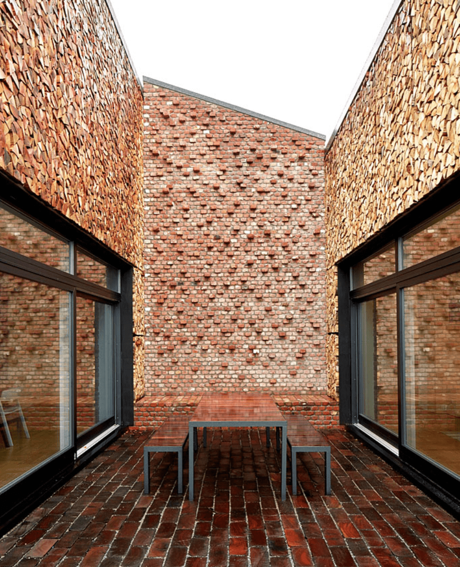 Courtyard with orange brick walls and floor 